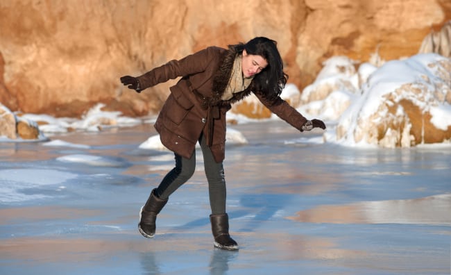 Woman-Having-Accident-On-Ice